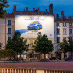 Communication visuelle secteur automobile - toile géante Volkswagen place Bellecour